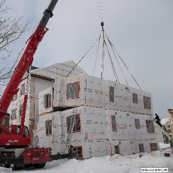 Construction de bâtiments de 5 à 6 étages en ossature légère de bois préfabriquée